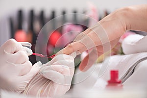 Woman hands receiving a manicure