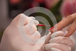 Woman hands receiving a manicure