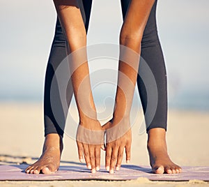 Woman, hands and stretching with yoga mat on beach in exercise, training or outdoor workout in nature. Closeup of female