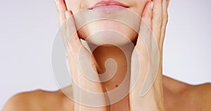 Woman, hands and touching face for beauty and skincare advertising, healthy skin and wellness with studio background