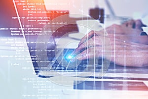 Woman hands typing on laptop, code