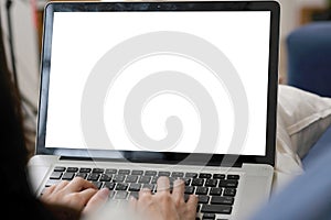 Woman hands typing laptop computer with blank screen for mock up template background, Laptop with blank screen backdrop for people
