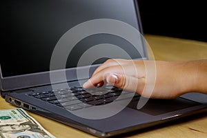 Woman hands typing laptop computer with online shopping, payment cyber monday sale business and technology