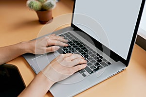 Woman hands typing on laptop keyboard at the office, Woman worker and business concept