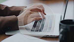 Woman hands typing laptop on table close up. Unknown girl working computer.