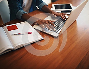 Woman hands, typing and laptop with work from home and learning notes. Student, female person and computer working with