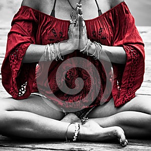 Woman hands in yoga symbolic gesture mudra photo