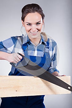 Woman with handsaw