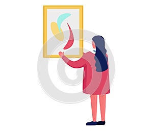 Woman hanging abstract art on wall. Female admires modern painting in gallery. Art appreciation and home decor vector