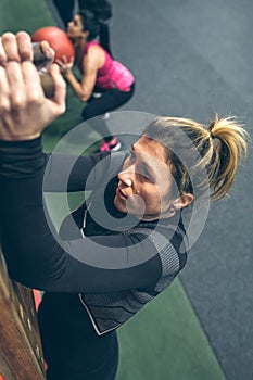 Woman hanging on the pegboard