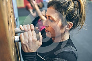 Woman hanging on the pegboard