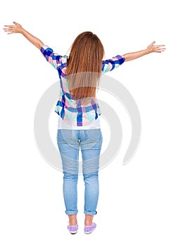 Woman happily greets someone. girl waving.