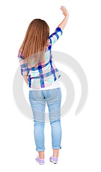 Woman happily greets someone. girl waving.