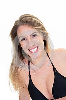 Woman happiness smiling portrait with tattoo against white background in swimsuit bra