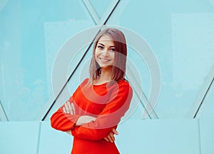 Woman happy. Closeup portrait head shot of beautiful smiling toothy sunshine girl student red dress looking at you camera.