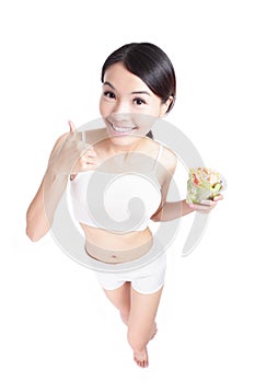 Woman happy eat salad with good gesture