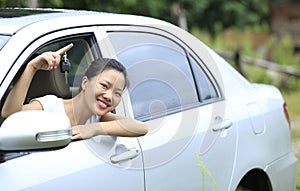 Woman happy with first car