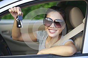 Woman happy with first car