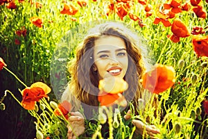 Woman or happy girl in field of poppy seed