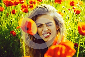 Woman or happy girl in field of poppy seed