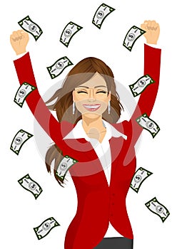 Woman happy seeing raining money bills photo