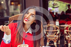 Woman happy smiling eating desert