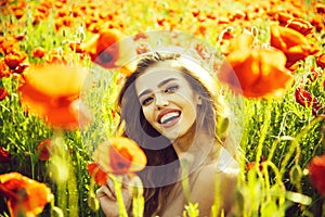 Woman or happy girl in field of poppy seed