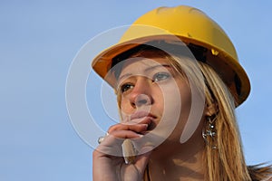 Woman in a hard hat.