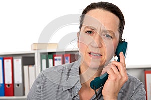Woman has a disagreeable phone call