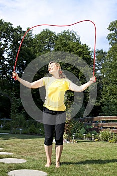 Woman has fun with jumping rope