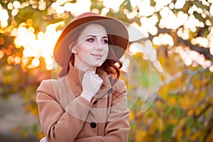 Woman in hat and coat