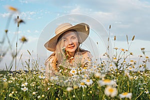 Woman in hat enjoy in the field