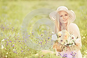 Woman in Hat with Flowers Bouquet, Fashion Model Summer Field