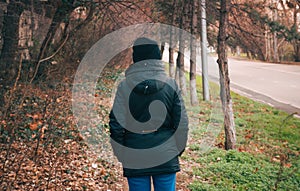 Woman in hat and jacket