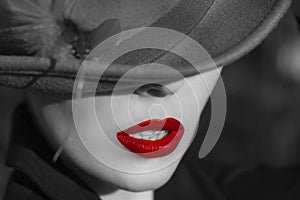 Woman in hat. Red lips.