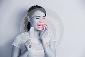 Woman have sensitive teeth photo