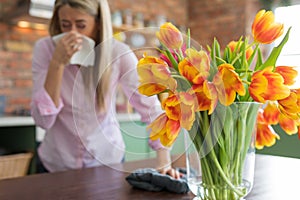 Woman having allergies to flowers