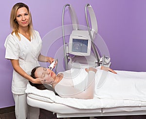 Woman having anti cellulite massage with therapist