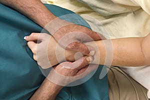 Woman having arm massaged