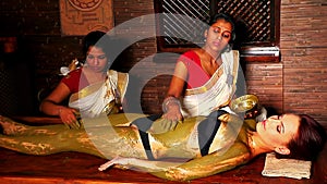 Woman having Ayurvedic body spa massage