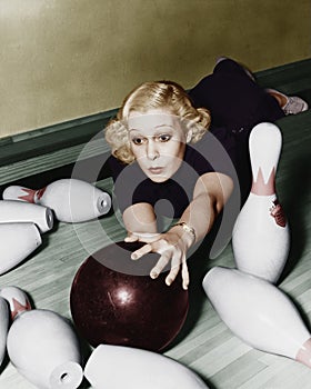 Woman having bowling accident photo