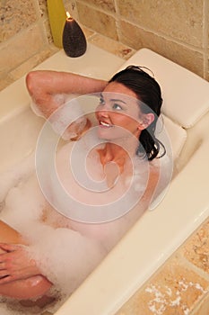 Woman having a bubble bath
