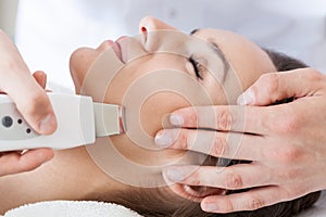 Woman having cavitation peeling