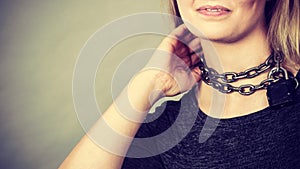 Woman having chain around neck