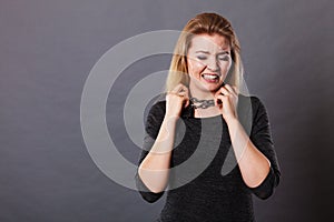 Woman having chain around neck