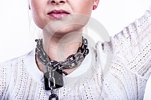 Woman having chain with padlock on neck