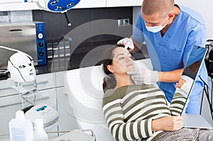 Woman having consultation with doctor in clinic