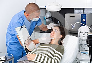 Woman having consultation with doctor in clinic