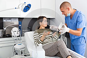 Woman having consultation with doctor in clinic