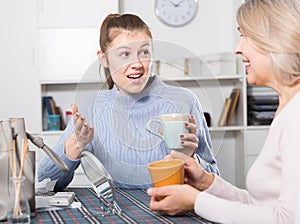 Woman having conversation with daughter